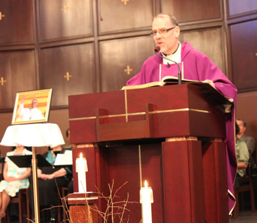 Fr. Gary preaching